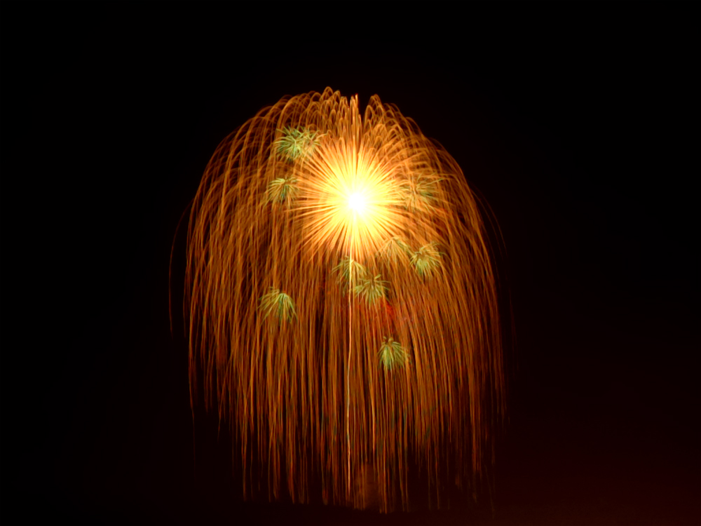 Giant firework shell bursting at Katakai Fireworks, Niigata