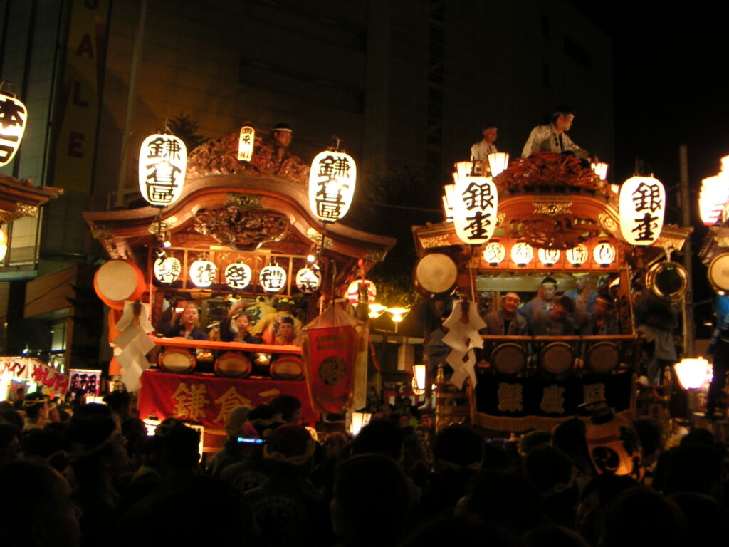 Illuminated festival floats at Kumagaya Uchiwa Matsuri at night