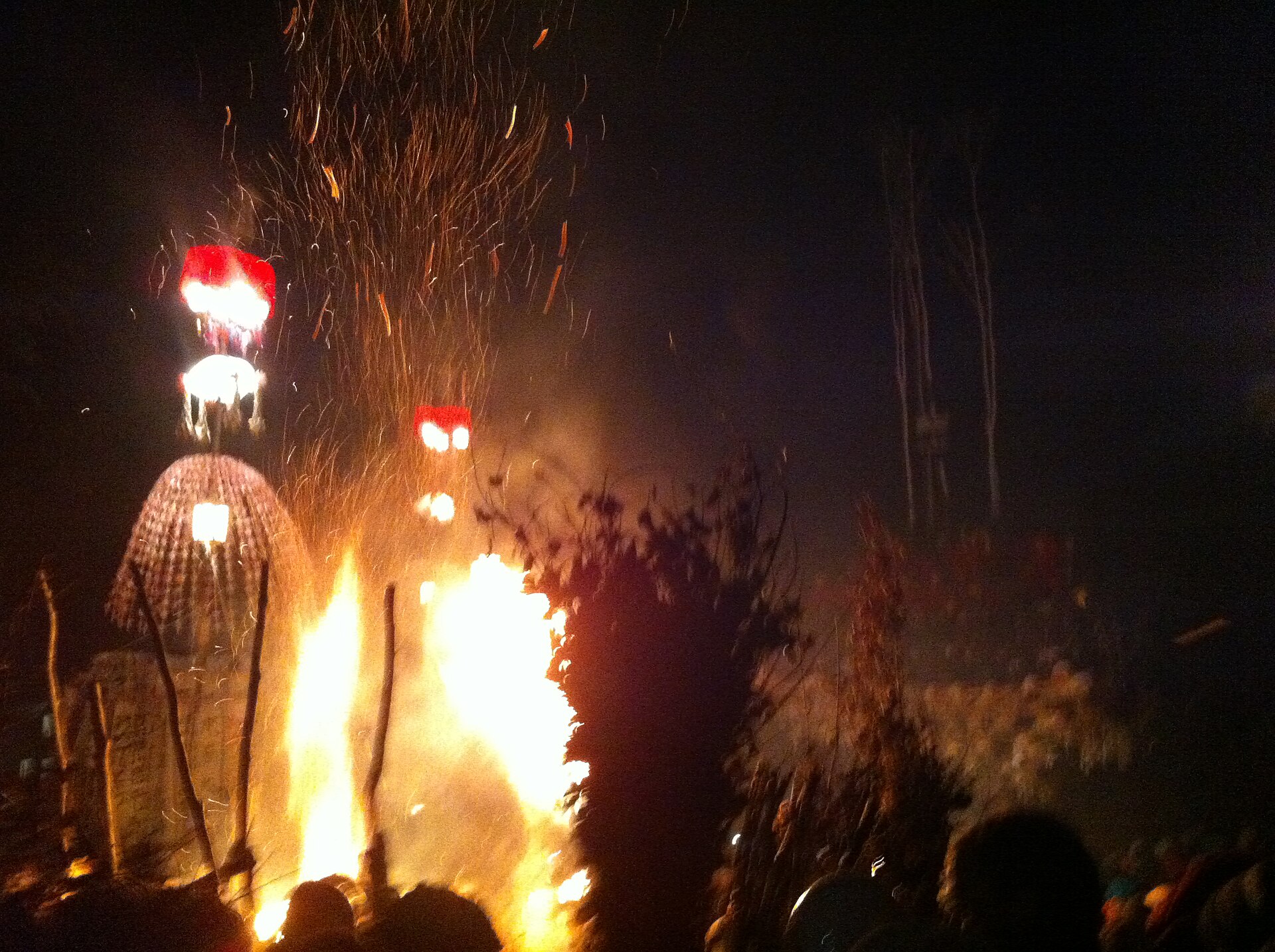 Nozawa Onsen Dosojin Fire Festival flames at night