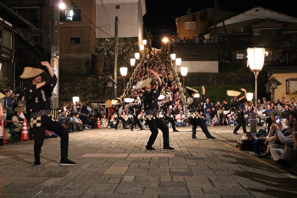 Night dancing under paper lanterns at Owara Kaze no Bon