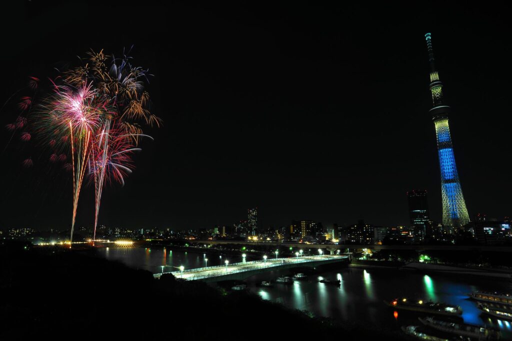 Fireworks bursting over the Sumida River in Tokyo