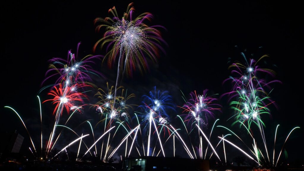 Competition fireworks lighting the night sky at Tsuchiura