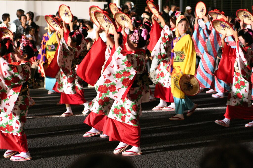 Dancers with flower-decorated hats at the Yamagata Hanagasa Festival