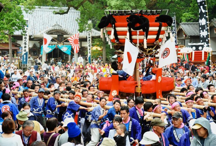 Chosa drum floats being carried at the Hiwasa Hachiman shrine autumn festival